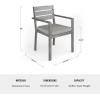 imageMartha Stewart Bedford 7 Piece Aluminum Patio Set with 62quot Table and 6 Stackable Chairs with Gray Brushed Woodgrain Finish Gray AllWeather Seat CushionsGrey