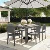imageMartha Stewart Bedford 7Piece IndoorOutdoor Dining Set with 6 Stackable Chairs and 62quot Patio Table with Faux Wood Top and Rattan Wicker Finish in GrayGrey