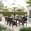 imageMartha Stewart Bedford 9Piece IndoorOutdoor Dining Set with 6 Stackable Chairs and 71quot Patio Table with Faux Wood Top and Rattan Wicker Finish in GrayBrown