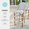 imageMartha Stewart Lily Pond IndoorOutdoor Stackable Bar Stools with Gray Woodgrain Aluminum Frame Finish WhiteGray Woven Rattan Backrests and Seats Set of 2Navy  WhiteNatural Frame