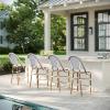 imageMartha Stewart Lily Pond IndoorOutdoor Stackable Counter Stool with Natural Woodgrain Aluminum Frame Finish and WhiteNavy Woven Rattan Backrest and SeatNavy  WhiteNatural Frame